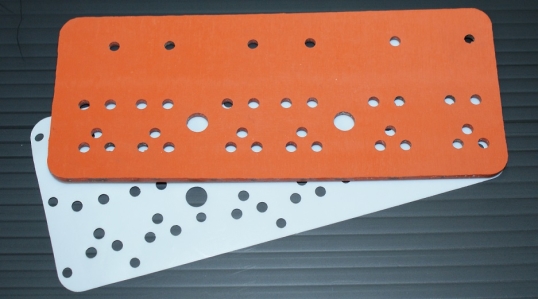 Red silicon press board and Teflon protective preform sheet for epoxy film adhesive process